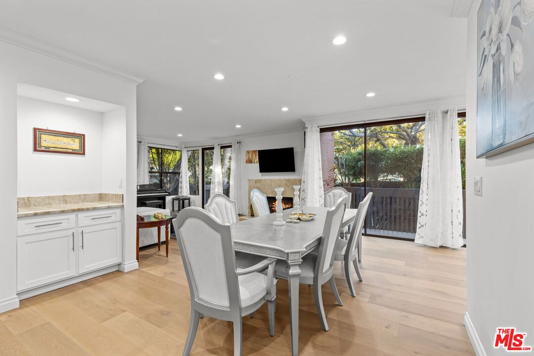 Dining room, Fireplace, Interior, Piano, Recessed Lighting, Wood Texture Flooring