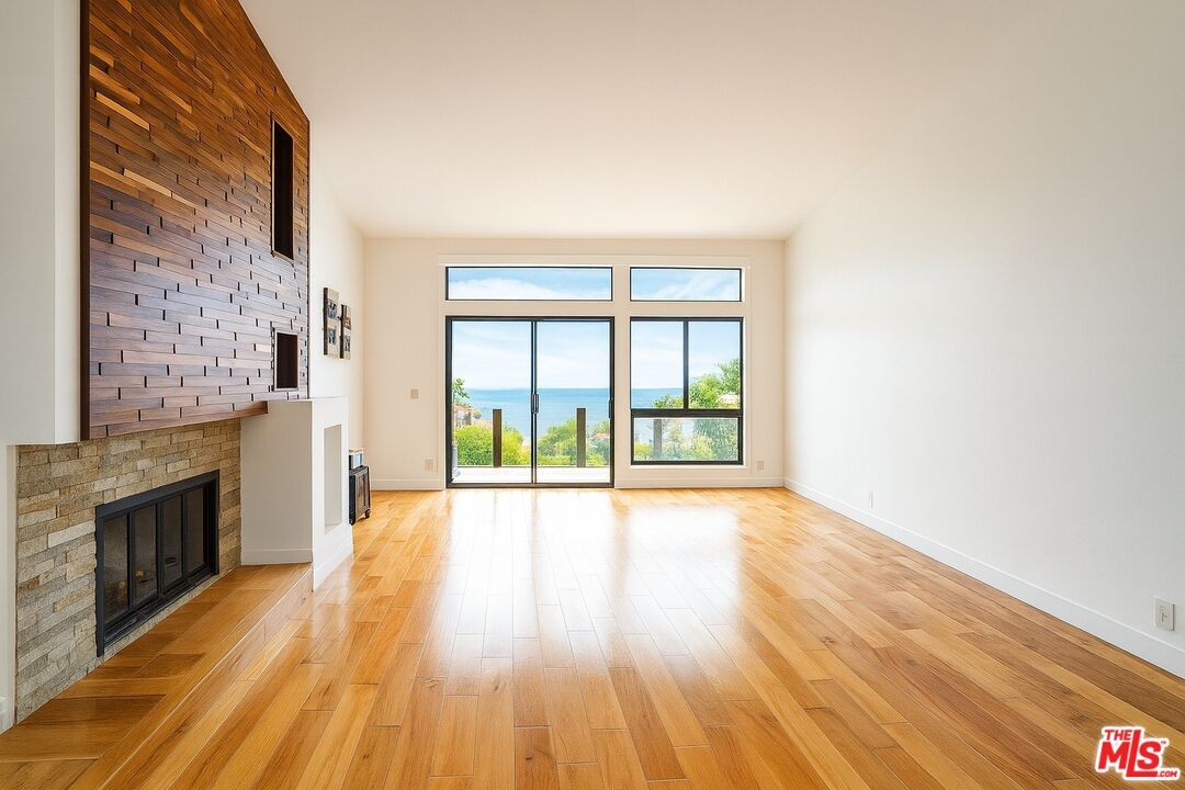 Empty room, Fireplace, Interior, Stone Walls, Water, Wood Texture Flooring, Wooden Walls