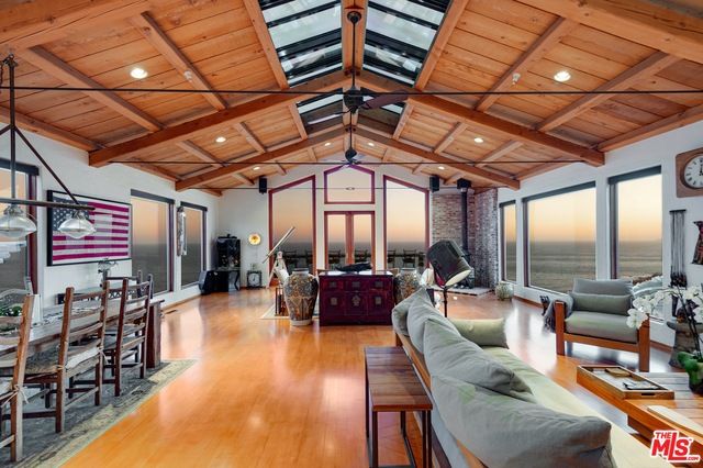 Dining room, Interior, Living room, Pendant Lights, Recessed Lighting, Water, Wooden Beams, Wooden Ceilings, Wood Texture Flooring