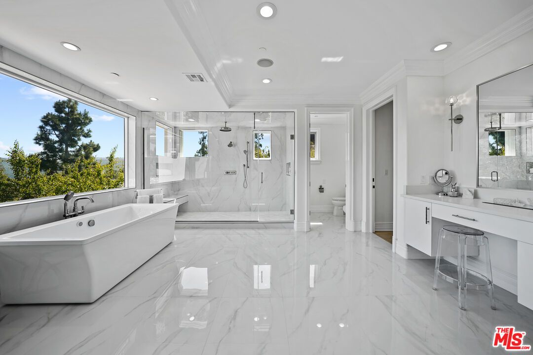 Bathroom, Free Standing Baths, Glass Shower, Interior, Marble, Marble Walls, Recessed Lighting