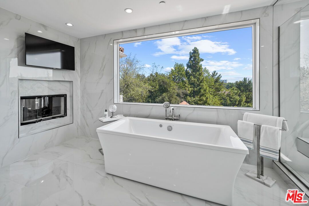 Bathroom, Fireplace, Free Standing Baths, Interior, Marble, Marble Walls, Recessed Lighting