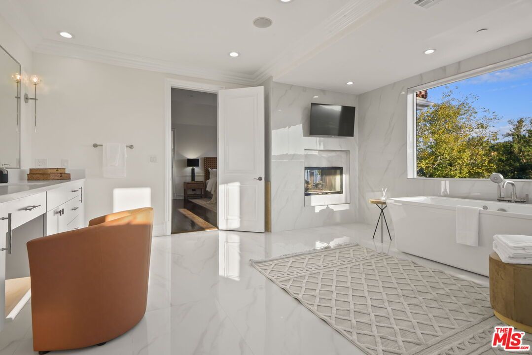 Bathroom, Fireplace, Free Standing Baths, Interior, Marble, Marble Walls, Recessed Lighting