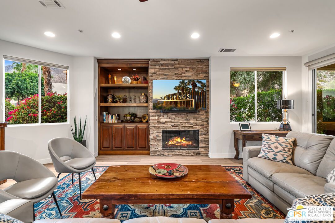 Fireplace, Interior, Living room, Recessed Lighting, Stone Walls, Wood Texture Flooring