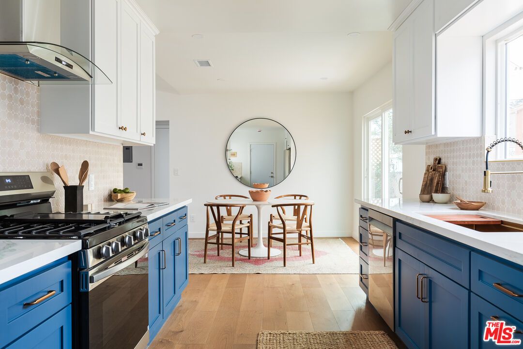 Dining room, Interior, Kitchen, Recessed Lighting, Stainless Steel Appliances, Wood Texture Flooring