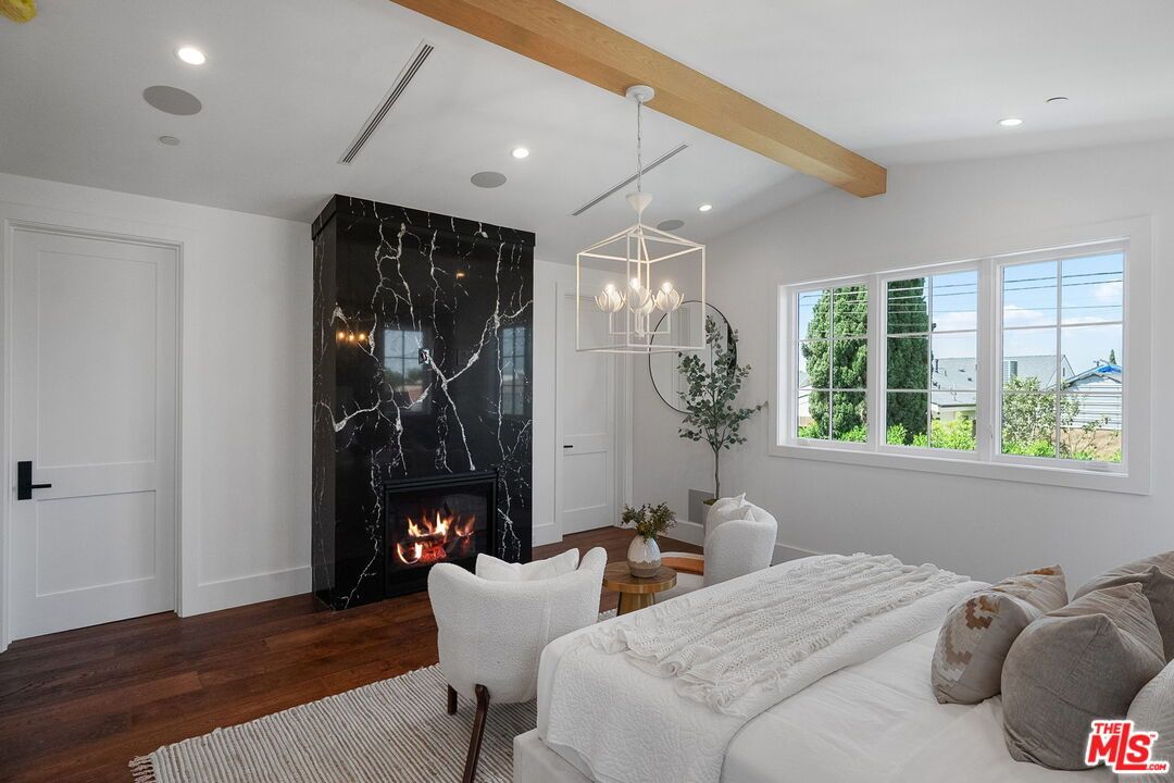 Bedroom, Fireplace, Interior, Marble Walls, Pendant Lights, Recessed Lighting, Wooden Beams, Wood Texture Flooring