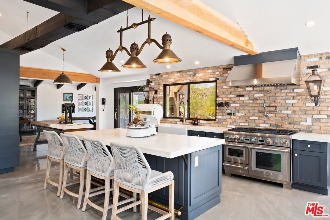 Interior, Kitchen, Pendant Lights, Recessed Lighting, Stainless Steel Appliances, Stone Walls, Wooden Beams