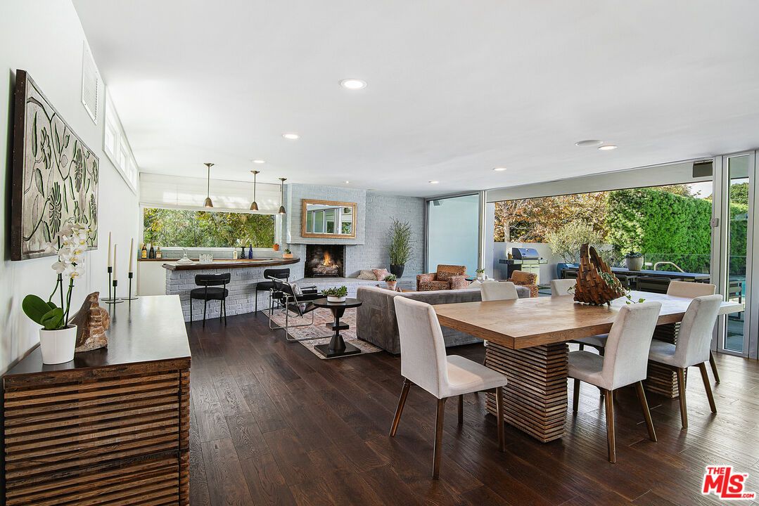 Dining room, Fireplace, Interior, Living room, Pendant Lights, Recessed Lighting, Wood Texture Flooring