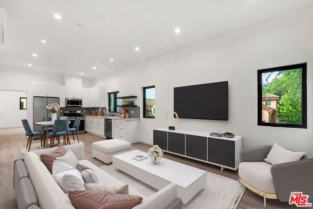 Dining room, Interior, Kitchen, Living room, Recessed Lighting, Stainless Steel Appliances, Wood Texture Flooring