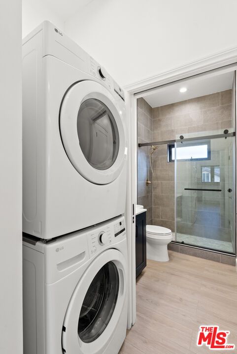 Bathroom, Glass Shower, Interior, Recessed Lighting, Utility Closets, Washer, Wood Texture Flooring