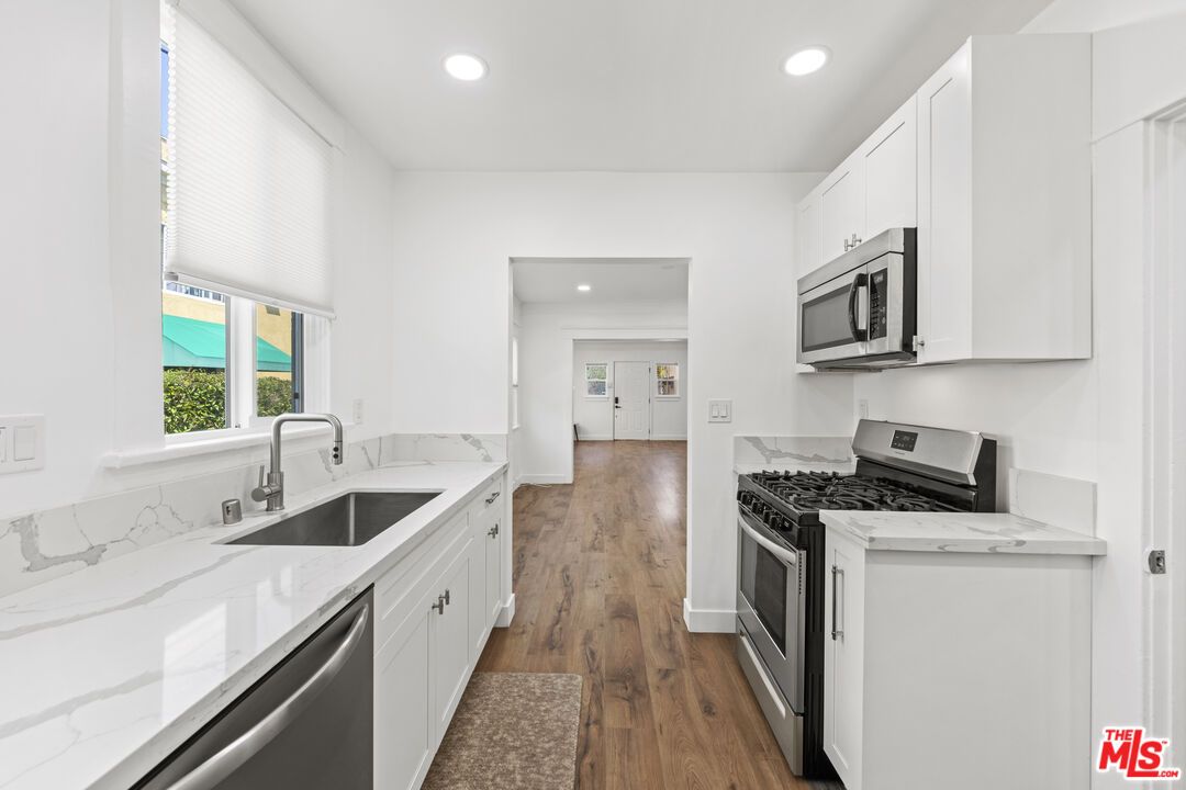 Interior, Kitchen, Recessed Lighting, Stainless Steel Appliances, Wood Texture Flooring