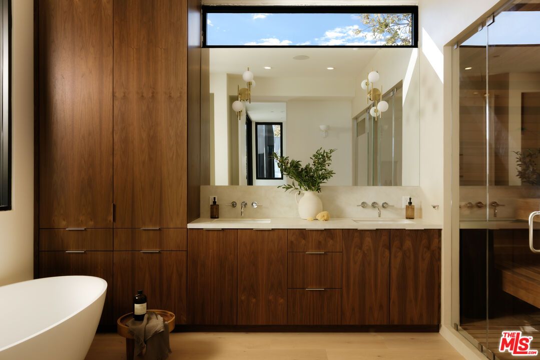 Bathroom, Dual Sink Vanities, Free Standing Baths, Glass Shower, Interior, Recessed Lighting, Wood Texture Flooring