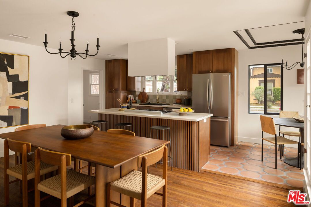 Chandelier, Dining room, Interior, Kitchen, Stainless Steel Appliances, Wood Texture Flooring