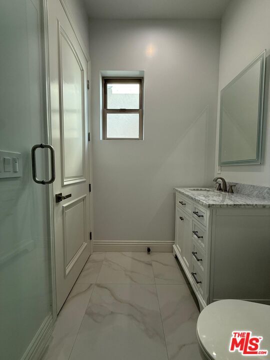 Bathroom, Dual Sink Vanities, Glass Shower, Interior, Marble, Recessed Lighting