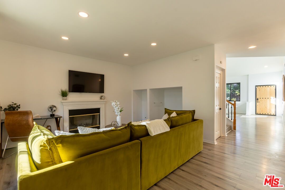 Fireplace, Interior, Living room, Recessed Lighting, Wood Texture Flooring