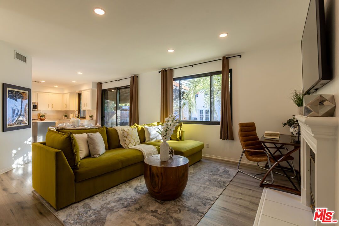 Fireplace, Interior, Kitchen, Living room, Recessed Lighting, Wood Texture Flooring