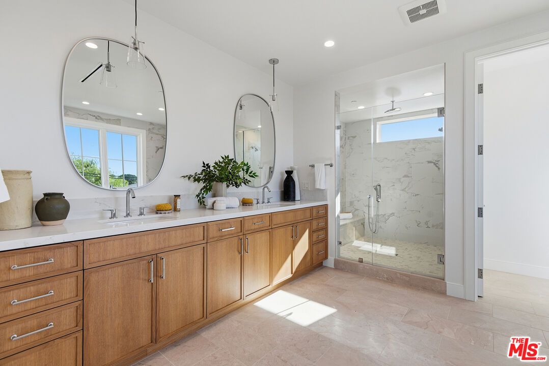 Bathroom, Dual Sink Vanities, Glass Shower, Interior, Marble Walls, Recessed Lighting