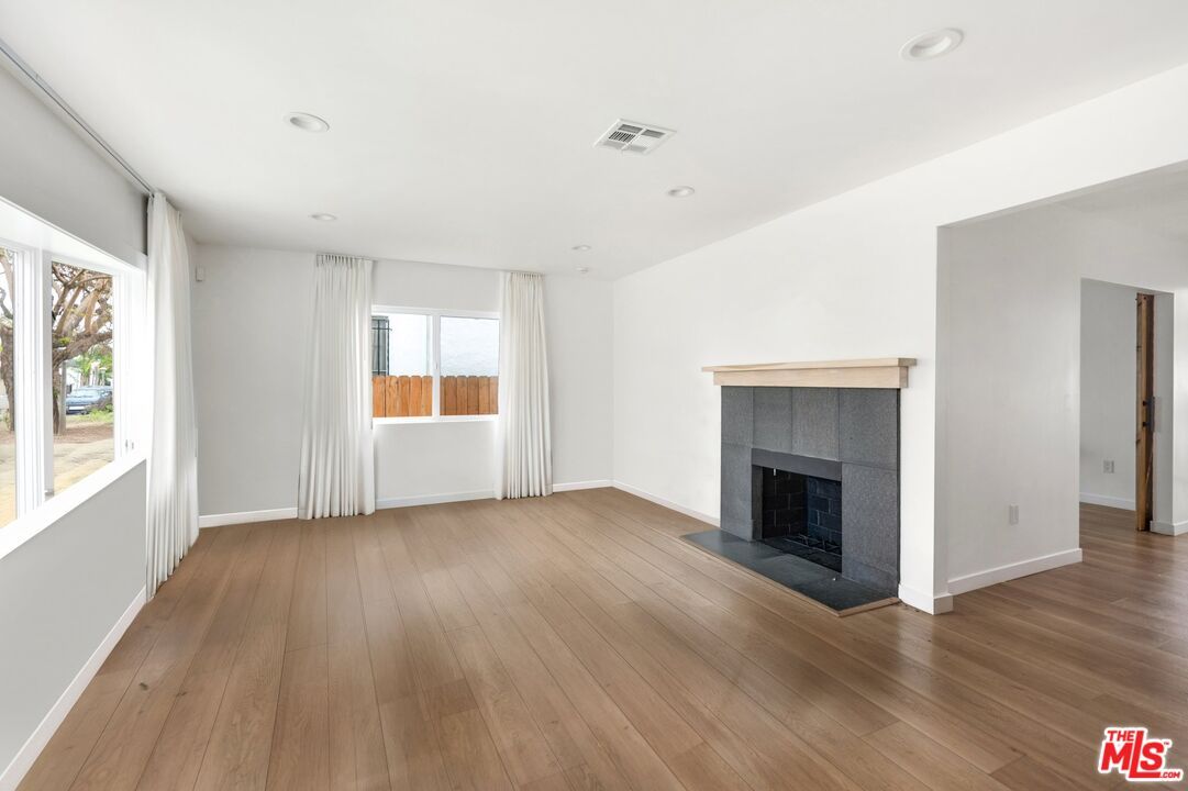 Empty room, Fireplace, Interior, Recessed Lighting, Wood Texture Flooring