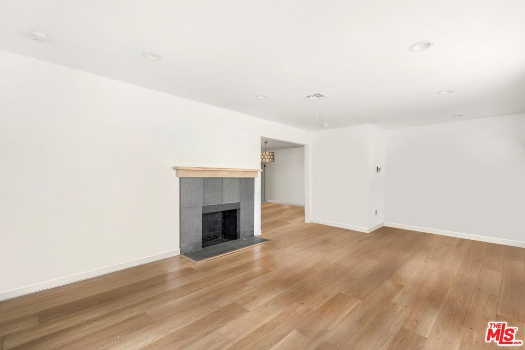 Empty room, Fireplace, Interior, Recessed Lighting, Wood Texture Flooring