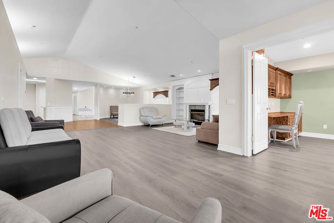 Dining room, Fireplace, Interior, Living room, Pendant Lights, Recessed Lighting, Wood Texture Flooring