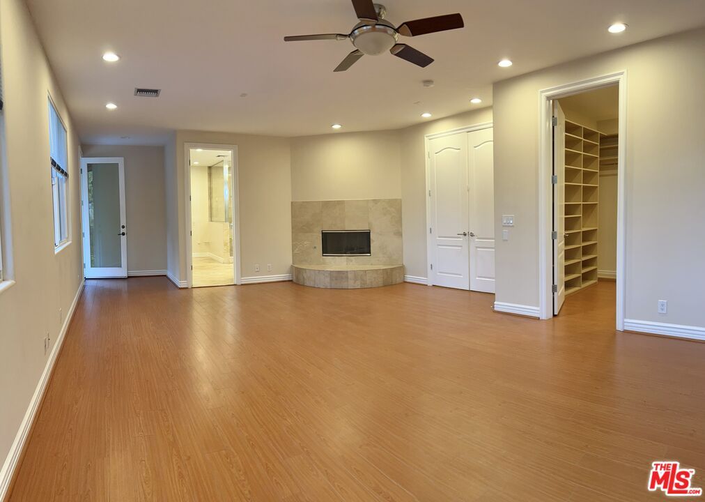 Empty room, Fireplace, Interior, Recessed Lighting, Wood Texture Flooring