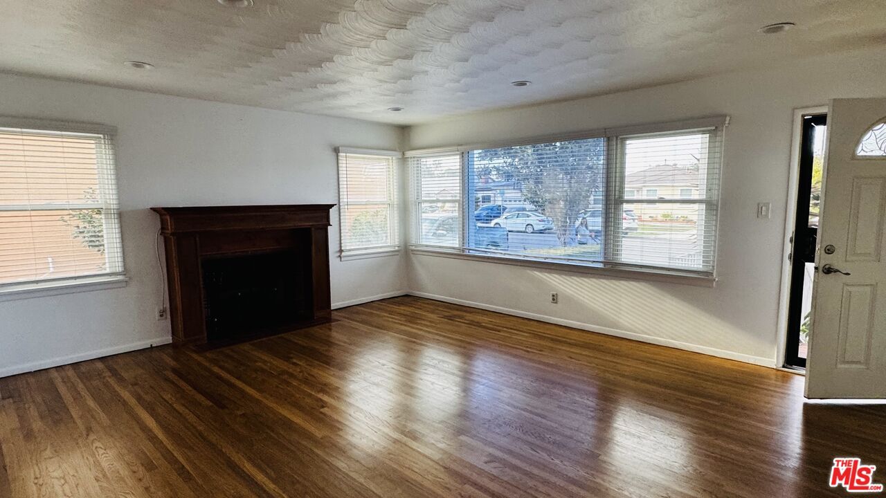 Empty room, Fireplace, Interior, Recessed Lighting, Wood Texture Flooring