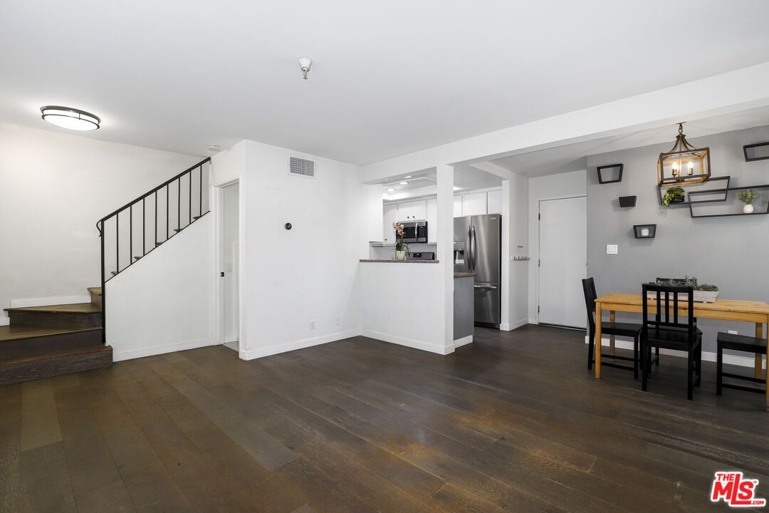 Dining room, Interior, Kitchen, Pendant Lights, Stainless Steel Appliances, Wood Texture Flooring