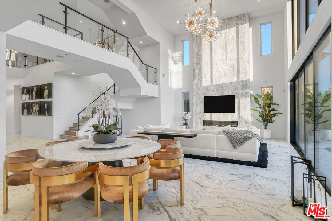 Chandelier, Dining room, Fireplace, Interior, Living room, Marble, Pendant Lights, Recessed Lighting