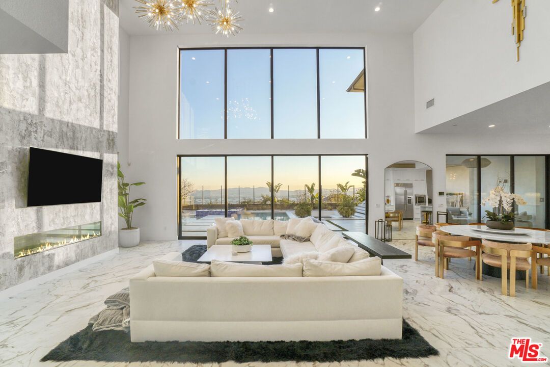 Dining room, Fireplace, Interior, Living room, Marble, Pendant Lights, Recessed Lighting, Water