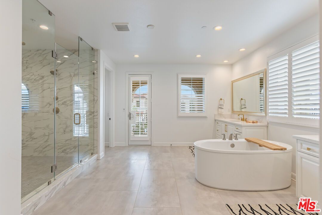 Bathroom, Free Standing Baths, Glass Shower, Interior, Marble Walls, Recessed Lighting