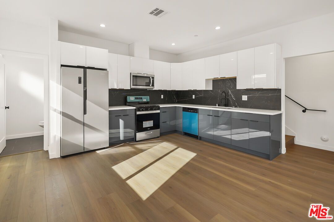 Interior, Kitchen, Recessed Lighting, Stainless Steel Appliances, Wood Texture Flooring