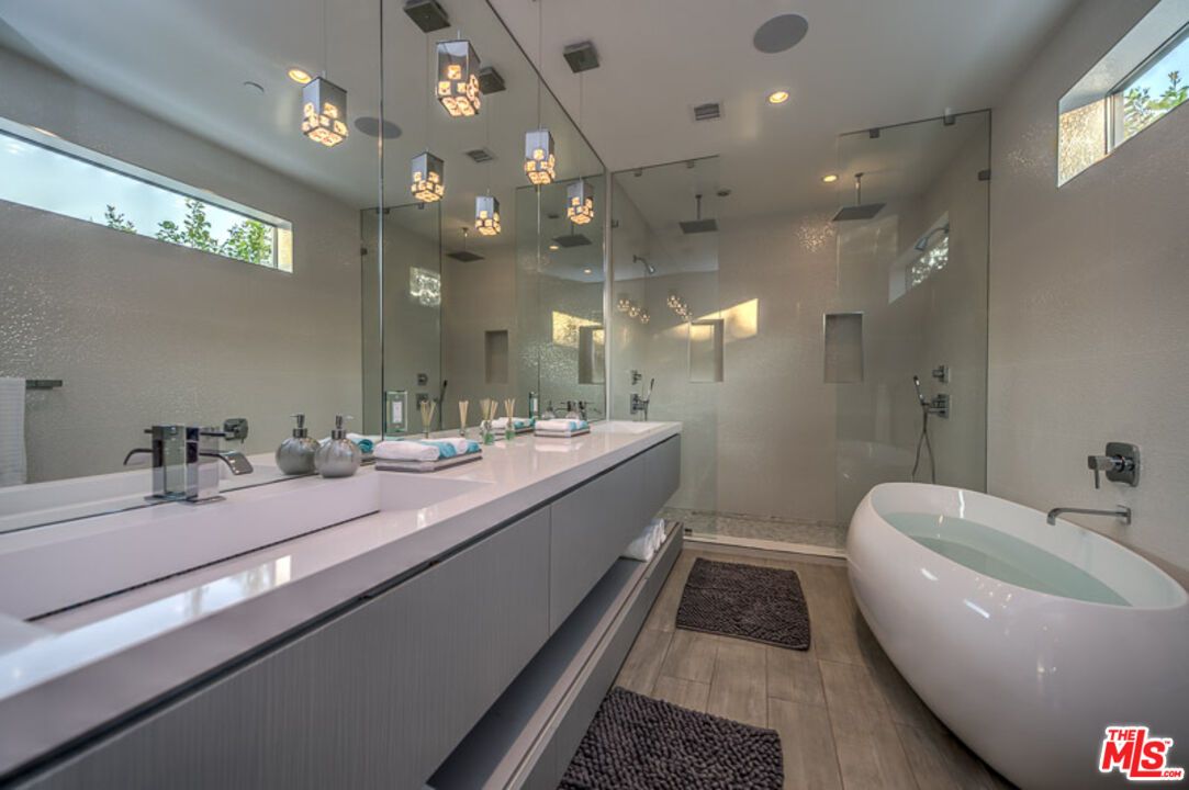 Bathroom, Dual Sink Vanities, Glass Shower, Interior, Pendant Lights, Recessed Lighting, Wood Texture Flooring