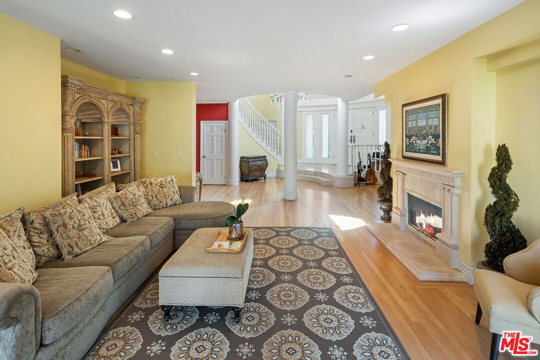 Fireplace, Interior, Living room, Recessed Lighting, Wood Texture Flooring