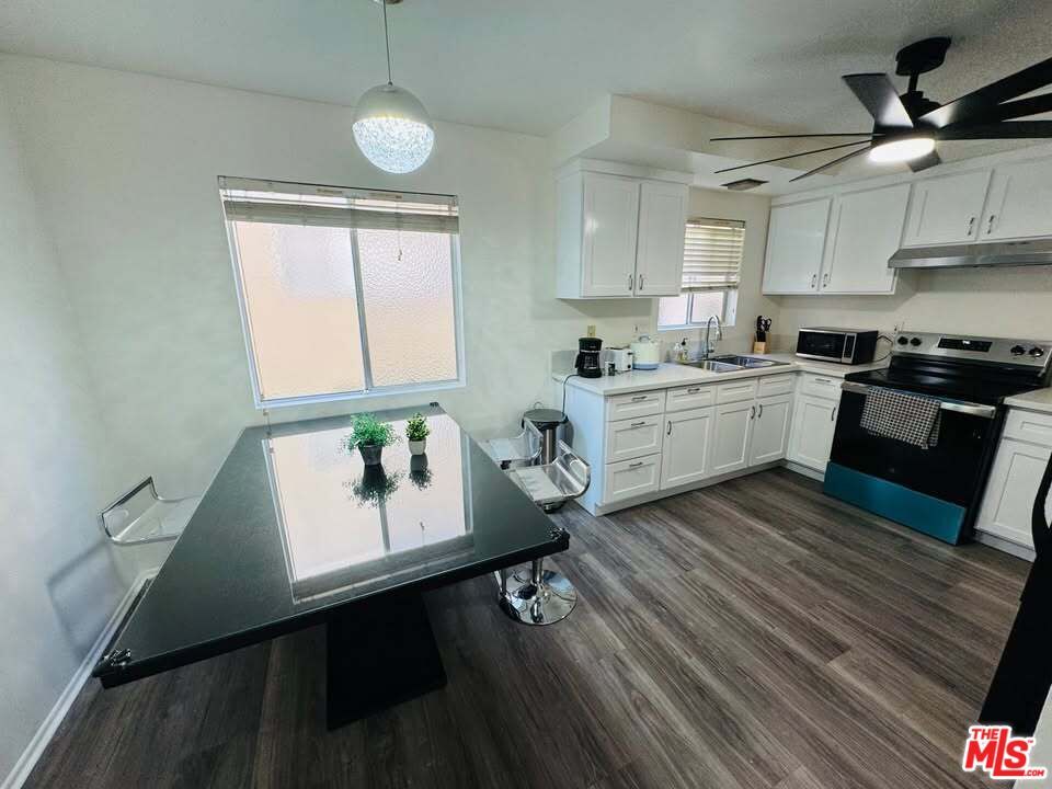 Dining room, Interior, Kitchen, Pendant Lights, Stainless Steel Appliances, Wood Texture Flooring