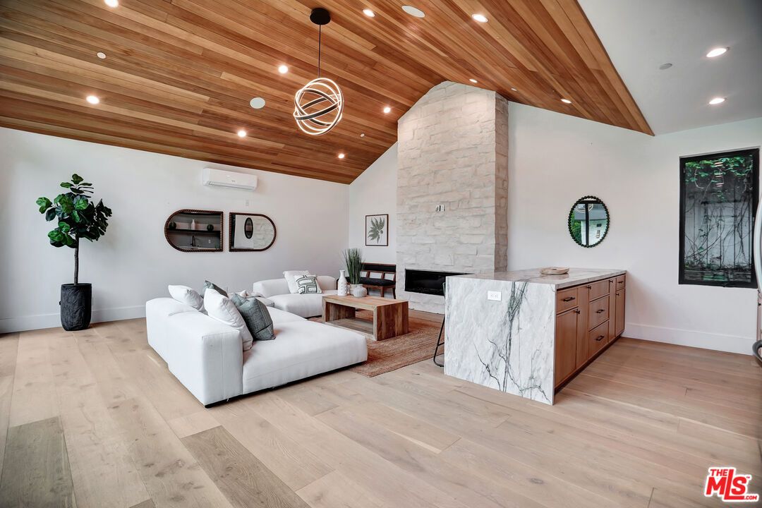 Fireplace, Interior, Living room, Pendant Lights, Recessed Lighting, Wooden Ceilings, Wood Texture Flooring