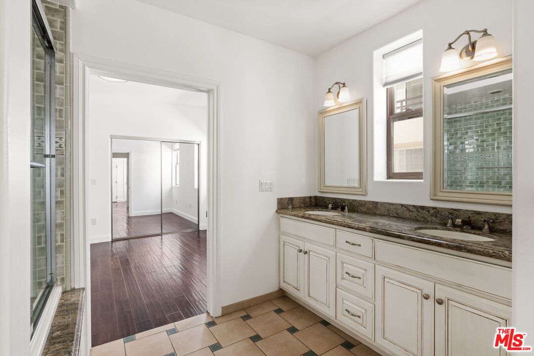 Bathroom, Dual Sink Vanities, Glass Shower, Interior, Wood Texture Flooring