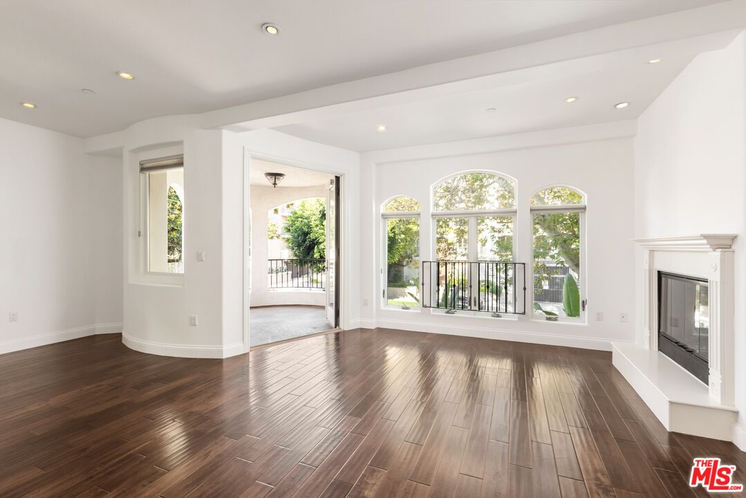 Empty room, Fireplace, Interior, Recessed Lighting, Wood Texture Flooring