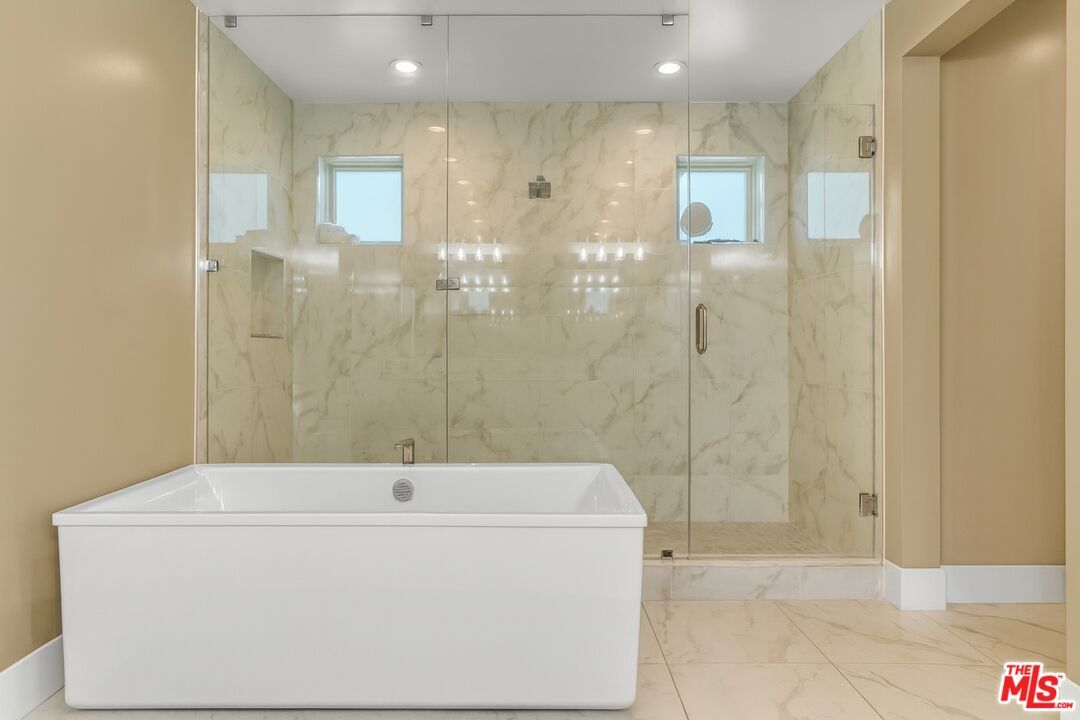 Bathroom, Free Standing Baths, Glass Shower, Interior, Marble, Marble Walls, Recessed Lighting