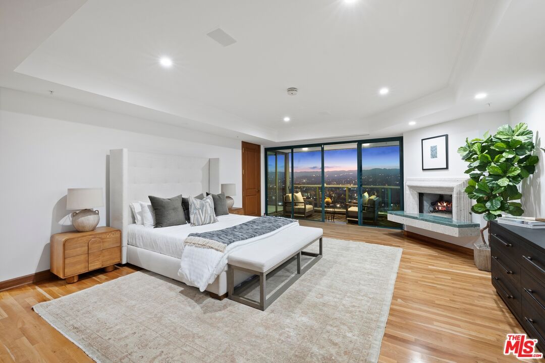 Bedroom, Fireplace, Interior, Recessed Lighting, Wood Texture Flooring
