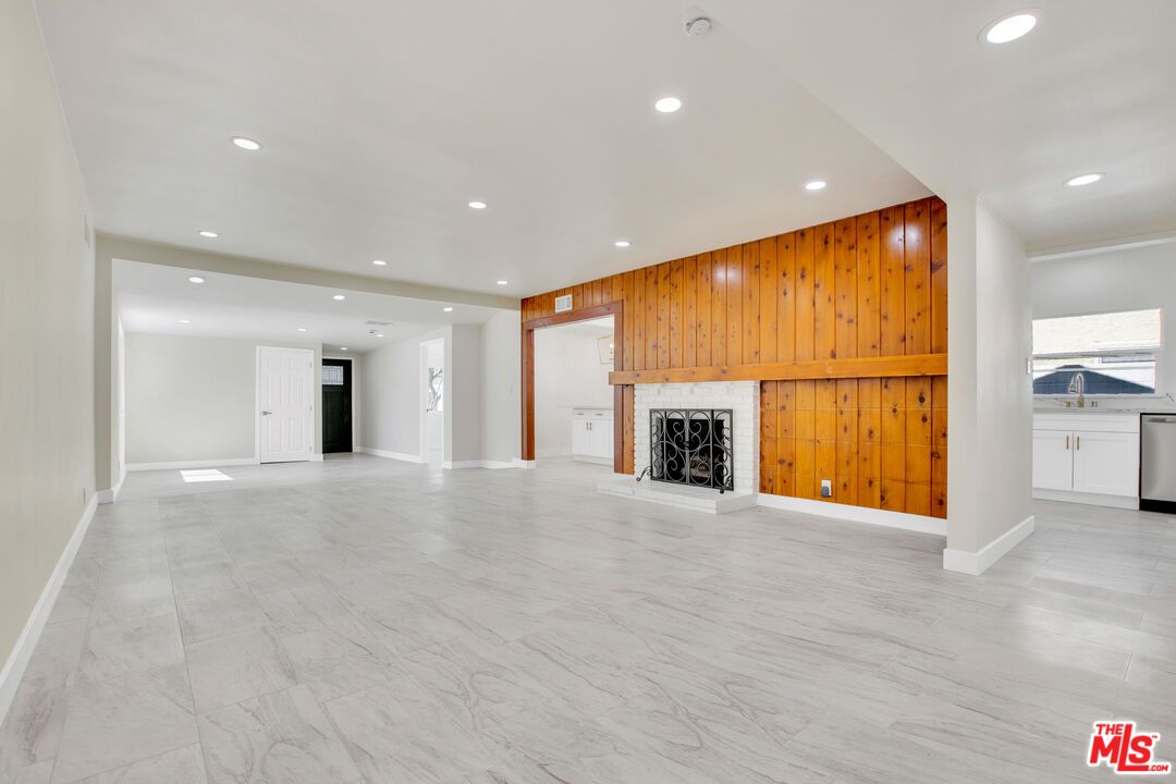 Empty room, Fireplace, Interior, Marble, Recessed Lighting, Wooden Walls