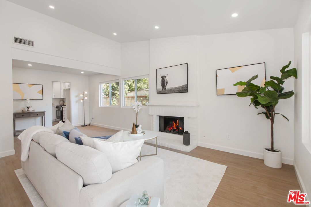 Fireplace, Interior, Living room, Recessed Lighting, Wood Texture Flooring