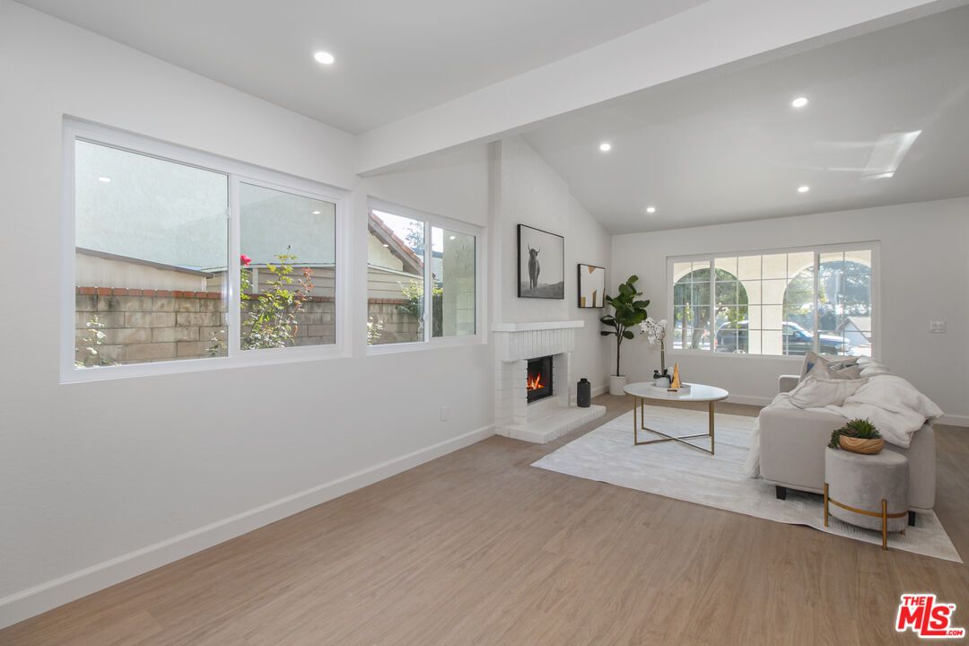 Fireplace, Interior, Living room, Recessed Lighting, Wood Texture Flooring