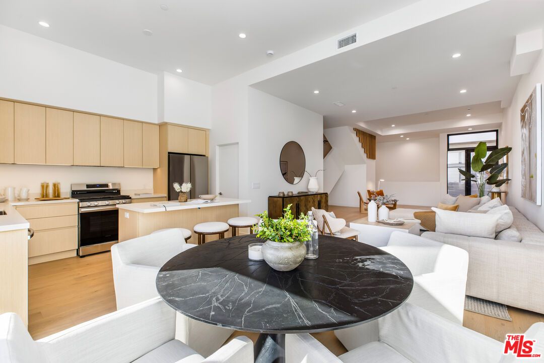 Dining room, Interior, Kitchen, Living room, Recessed Lighting, Stainless Steel Appliances, Wood Texture Flooring