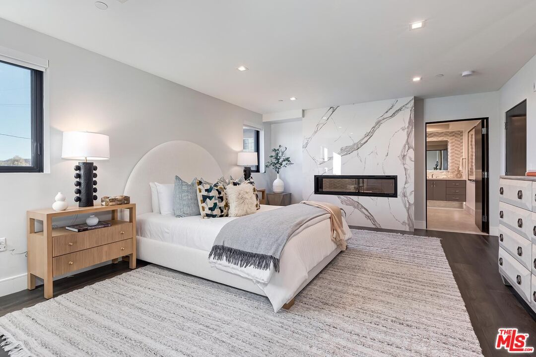 Bedroom, Fireplace, Interior, Marble Walls, Recessed Lighting, Wood Texture Flooring