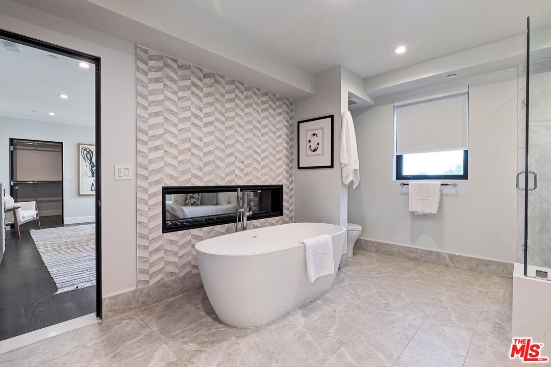 Bathroom, Fireplace, Free Standing Baths, Glass Shower, Interior, Recessed Lighting