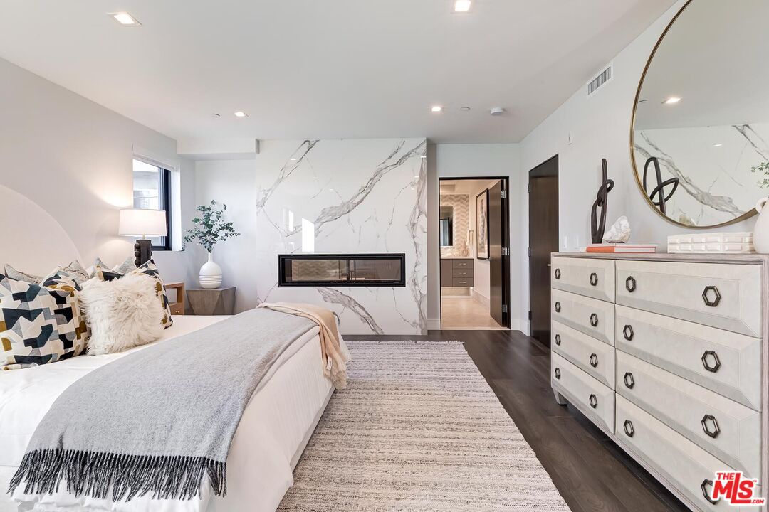 Bedroom, Fireplace, Interior, Marble Walls, Recessed Lighting, Wood Texture Flooring