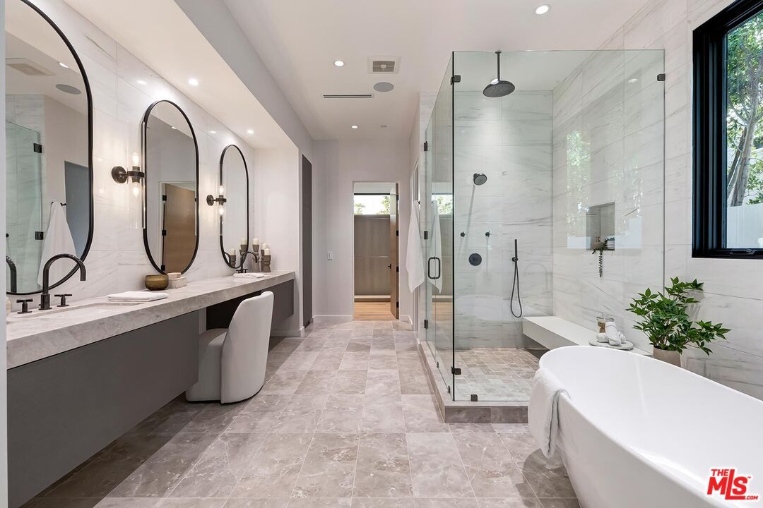Bathroom, Dual Sink Vanities, Free Standing Baths, Glass Shower, Interior, Marble Walls, Recessed Lighting