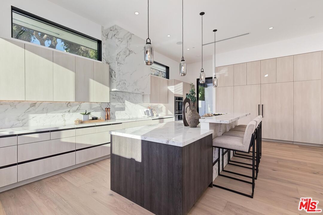 Interior, Kitchen, Marble Walls, Pendant Lights, Recessed Lighting, Wood Texture Flooring