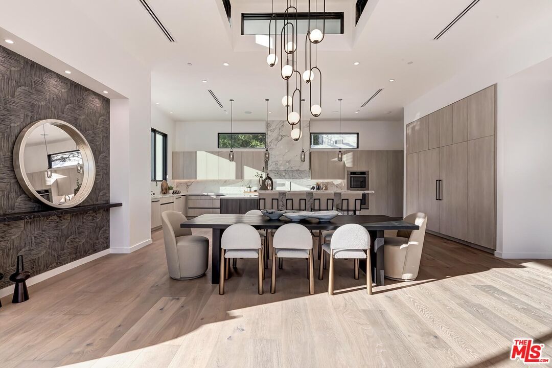 Dining room, Interior, Kitchen, Pendant Lights, Recessed Lighting, Stainless Steel Appliances, Wood Texture Flooring