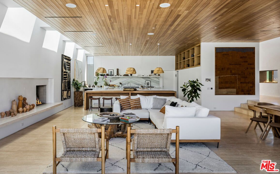 Dining room, Fireplace, Interior, Kitchen, Living room, Marble Walls, Pendant Lights, Recessed Lighting, Wooden Ceilings, Wood Texture Flooring