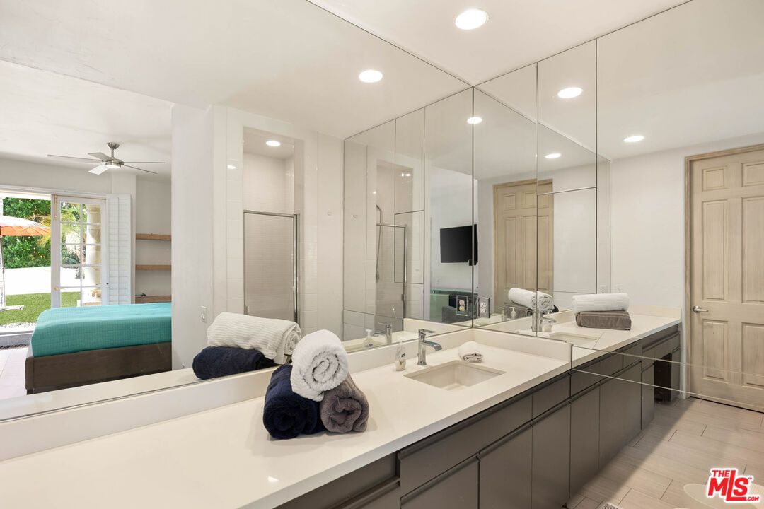 Bathroom, Dual Sink Vanities, Glass Shower, Interior, Recessed Lighting, Wood Texture Flooring